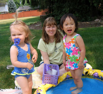 Grandma Linda had a wading pool ready for us, along with popcycles!